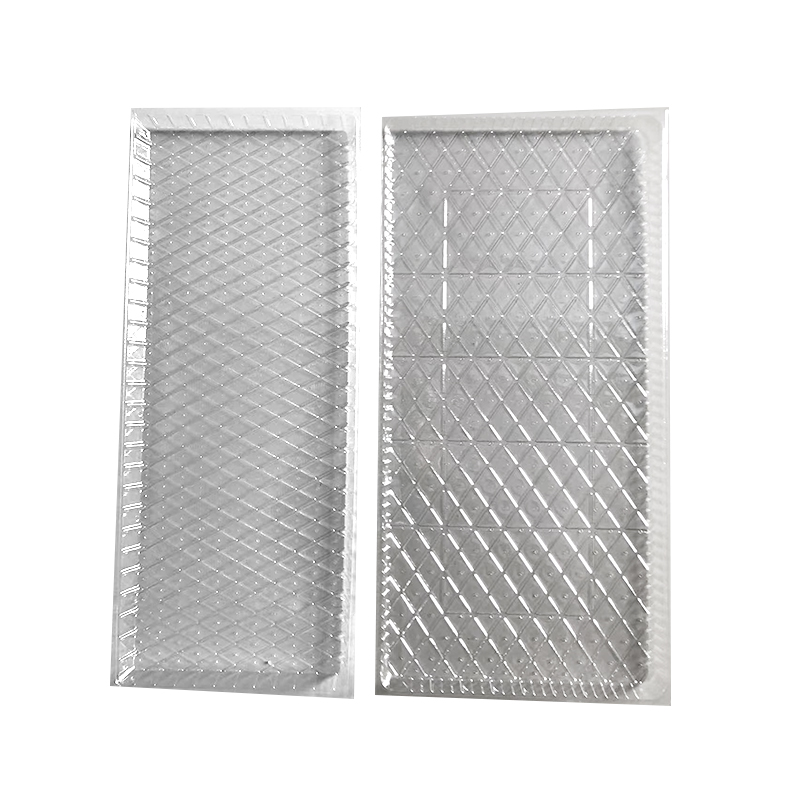 How do seedling trays simplify the planting process and increase the success rate?